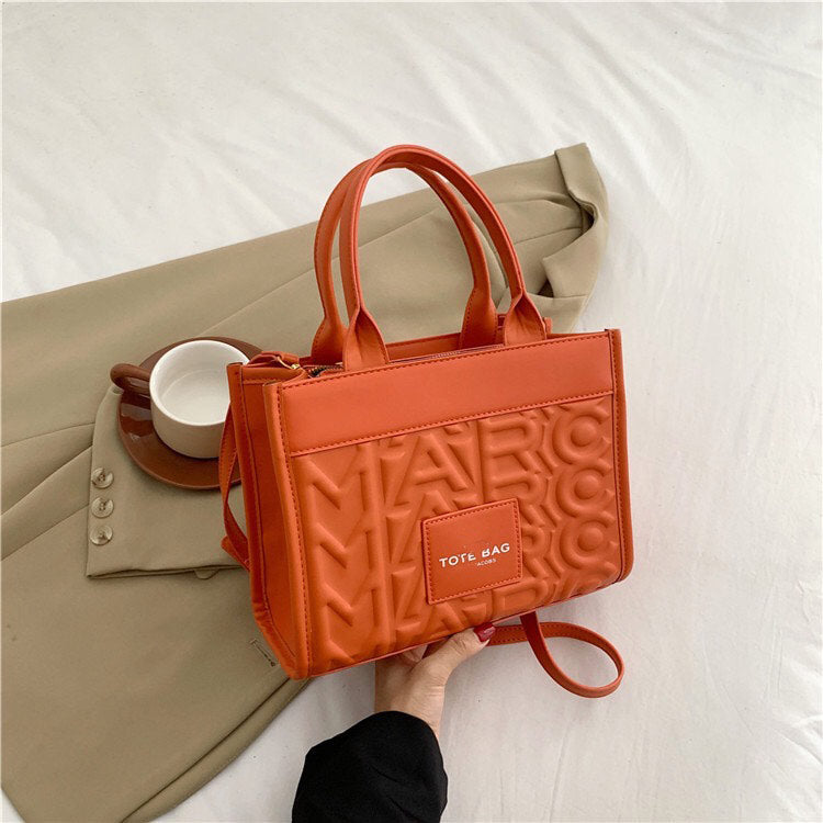 Embossed Letter Tote Bag